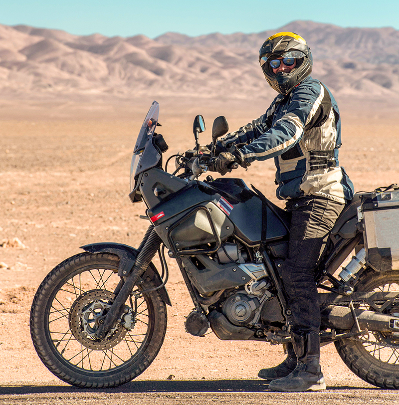 Adventure bike rider in desert
